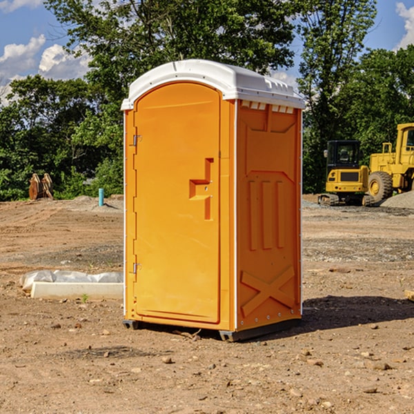 how often are the portable restrooms cleaned and serviced during a rental period in Hayden Lake